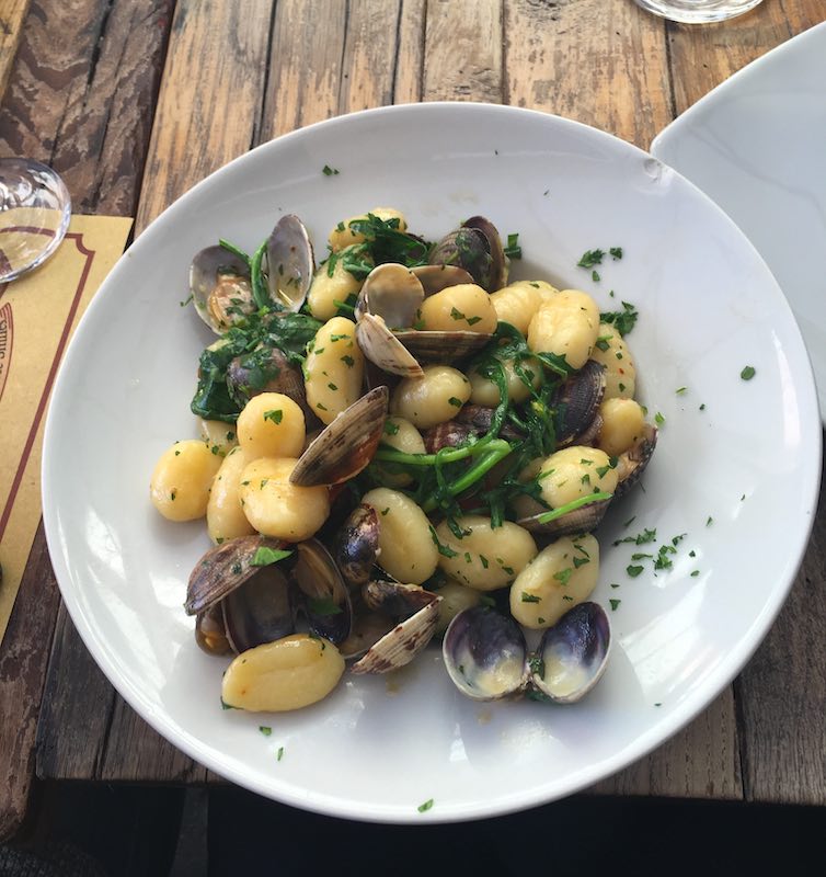 Gnocchi pasta with clams. Gnocchi pasta is among the most  popular food in Italy 