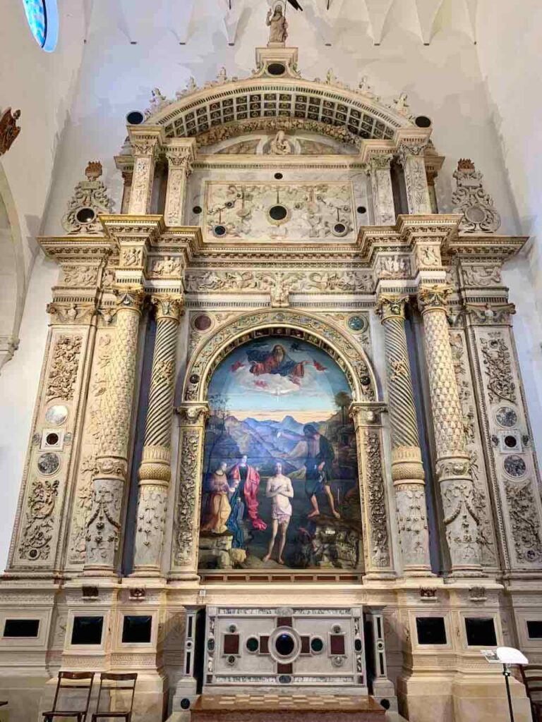 Giovanni Bellini’s Baptism of Christ  painting in the Santa Corona church in Vicenza 