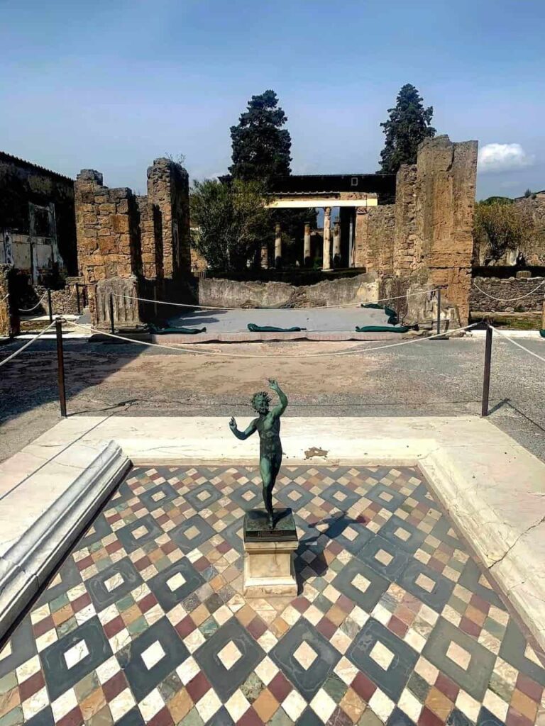 Replica of the Dancing Faun statue in the House of the Faun, Pompeii