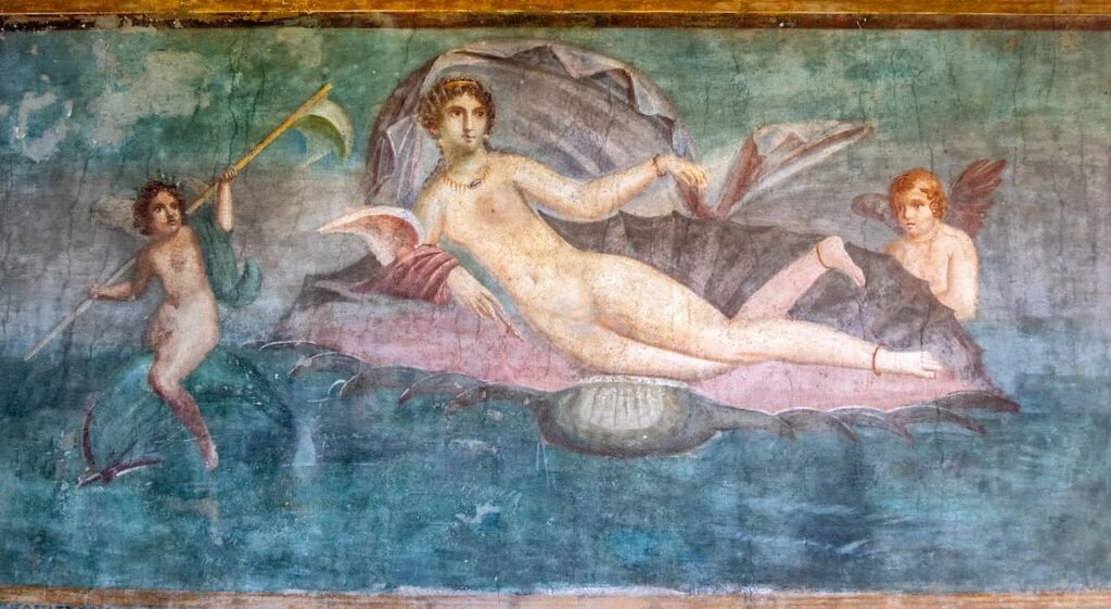 This ancient Roman fresco depicts the goddess Venus reclining in a seashell, accompanied by cupids