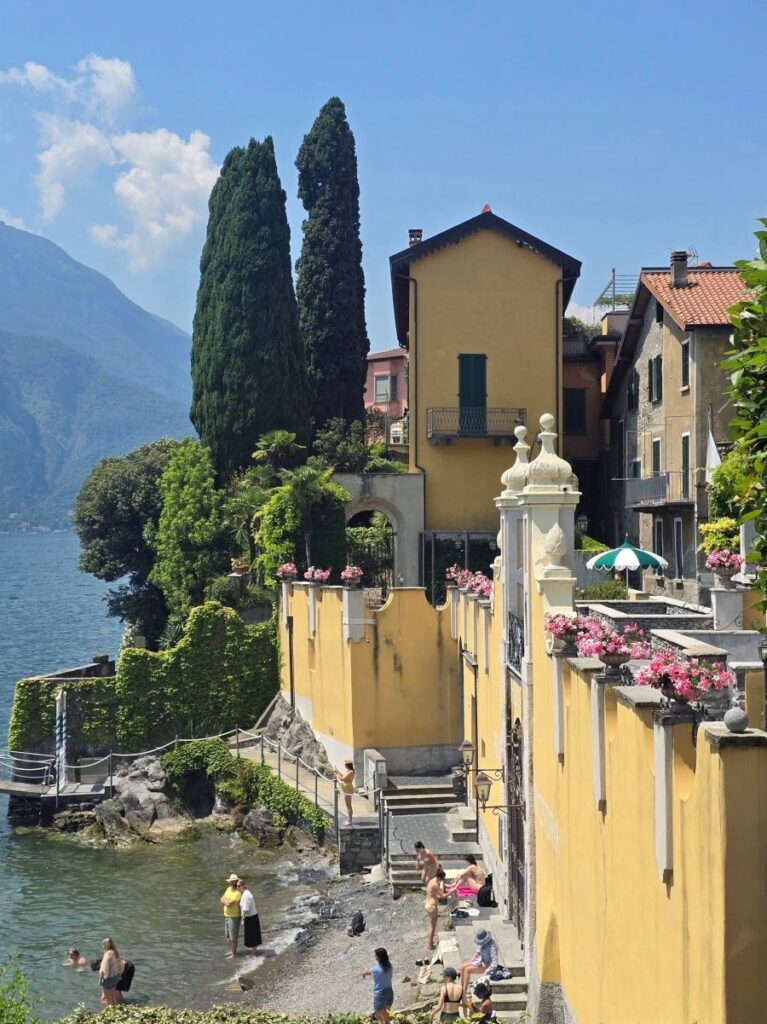 the picturesque waterfront of Hotel Villa Cipressi situated directly on the edge of Lake Como in Varenna.
