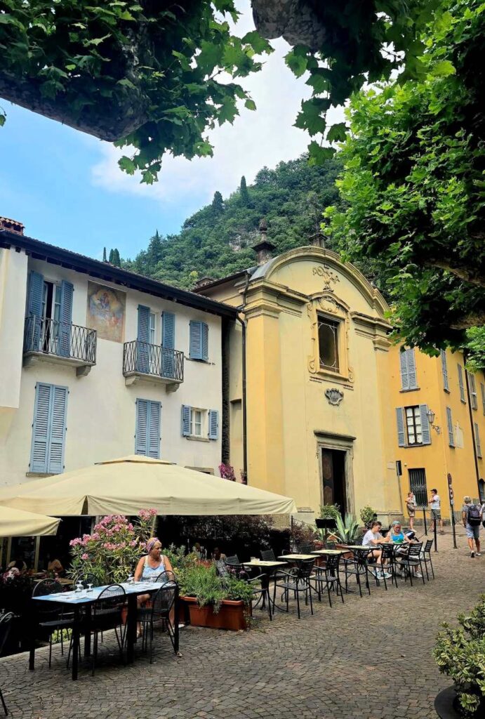 historic Church of San Giovanni Battista in the square in Varenna Lake Como 