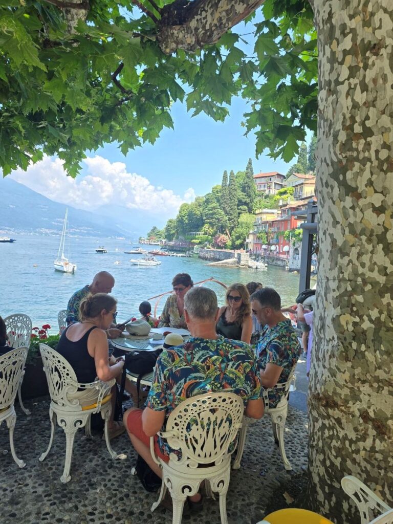 People dining at a table in Il Molo Bar in Varenna Italy 