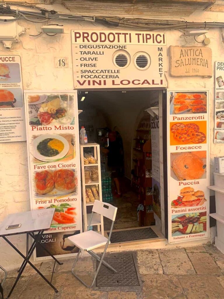 Antica Salumeria Centro Storico deli storefront on Via Cattedrale in Ostuni, Puglia, Italy