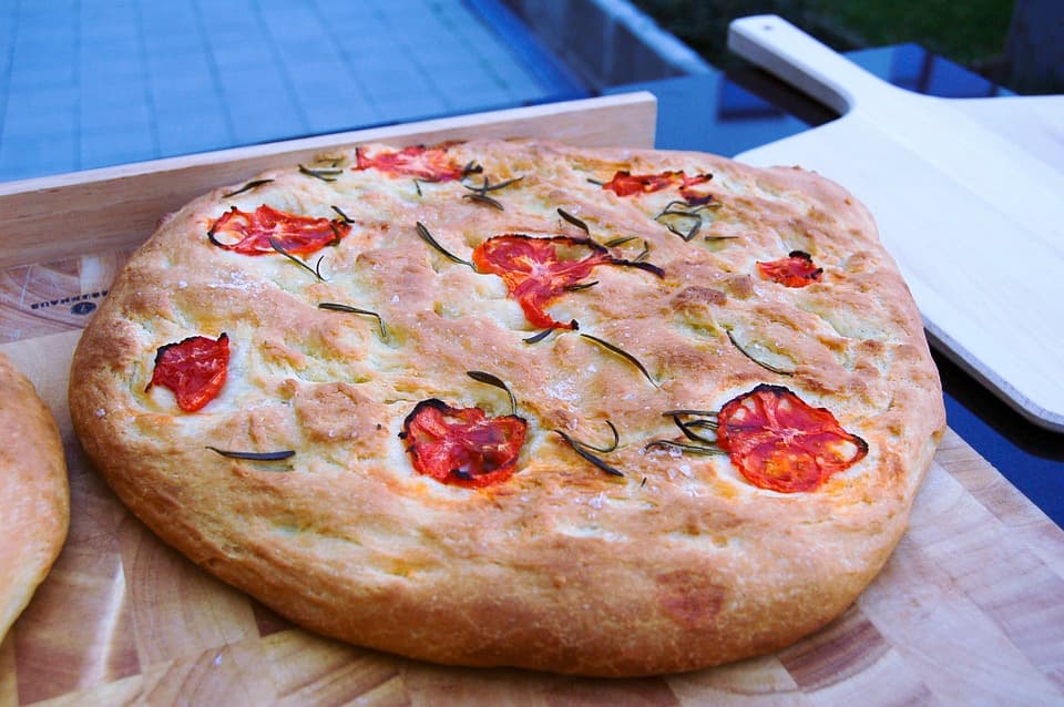 Food in Puglia: 23 Foods I Tried and Loved, From Cime di Rapa to Caffè Leccese Freshly baked focaccia Barese with cherry tomatoes and rosemary