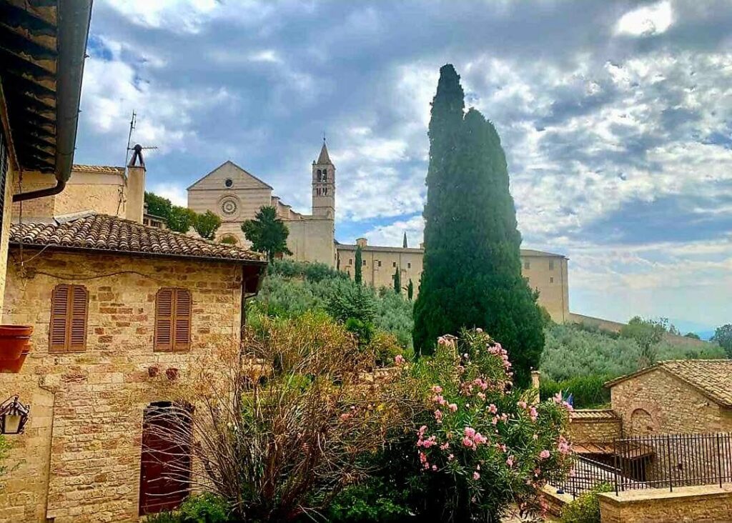 Basilica of Saint Clare rising above the historic town of Assisi, Italy
